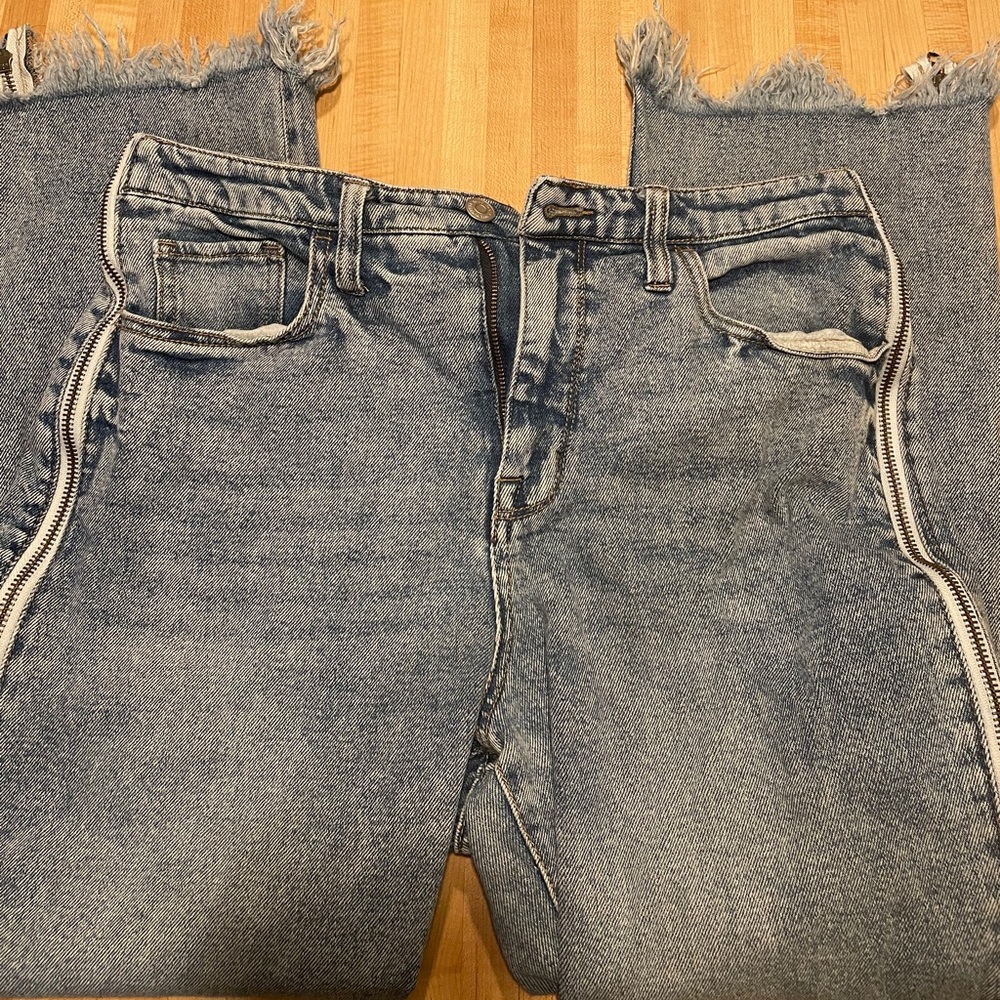 Jeans with side zippers